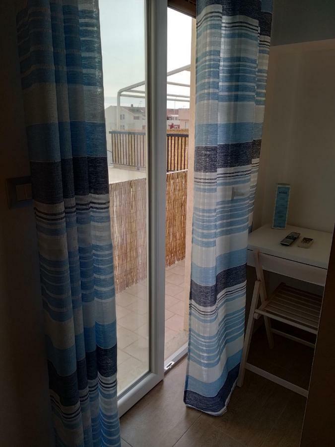 Omphalos Hotel Алгеро Екстериор снимка
